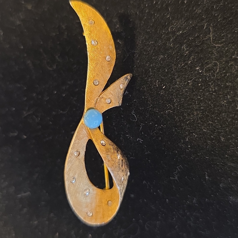 Half Bow Textured Gold Tone With Tiny Rhinestones And Blue Center Brooch